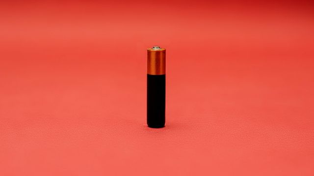 A battery standing on its end. 